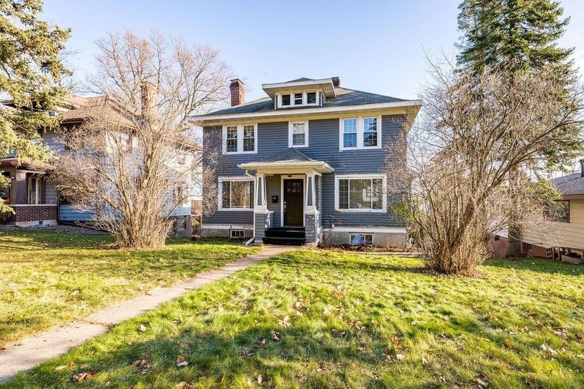 Don't miss this Chester Park traditional with Lake Superior - Beach Home for sale in Duluth, Minnesota on Beachhouse.com