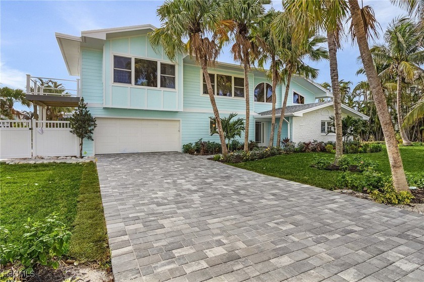 Experience true waterfront living at 1543 San Carlos Bay Drive - Beach Home for sale in Sanibel, Florida on Beachhouse.com