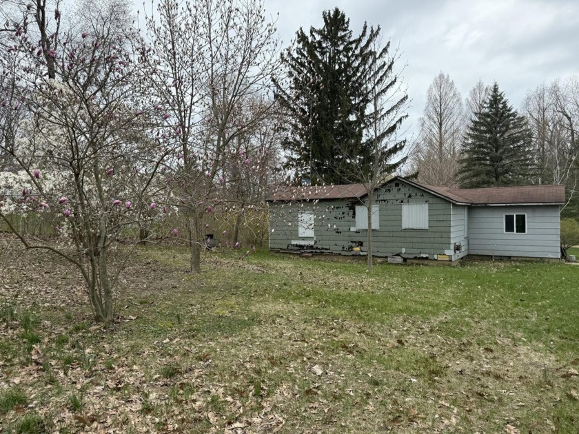 Located just one mile from the pristine shores of Lake Michigan - Beach Home for sale in Coloma, Michigan on Beachhouse.com