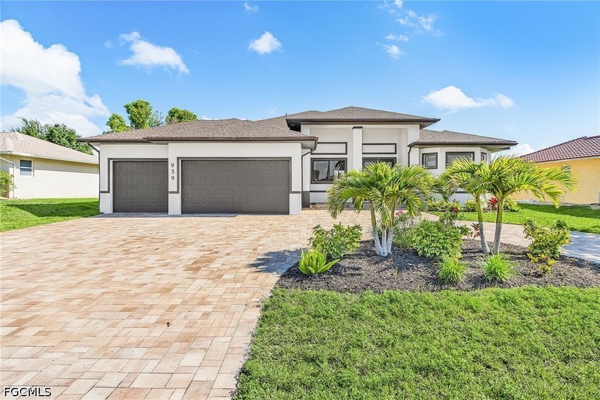 This newly built contemporary ranch in SW Cape Coral offers - Beach Home for sale in Cape Coral, Florida on Beachhouse.com
