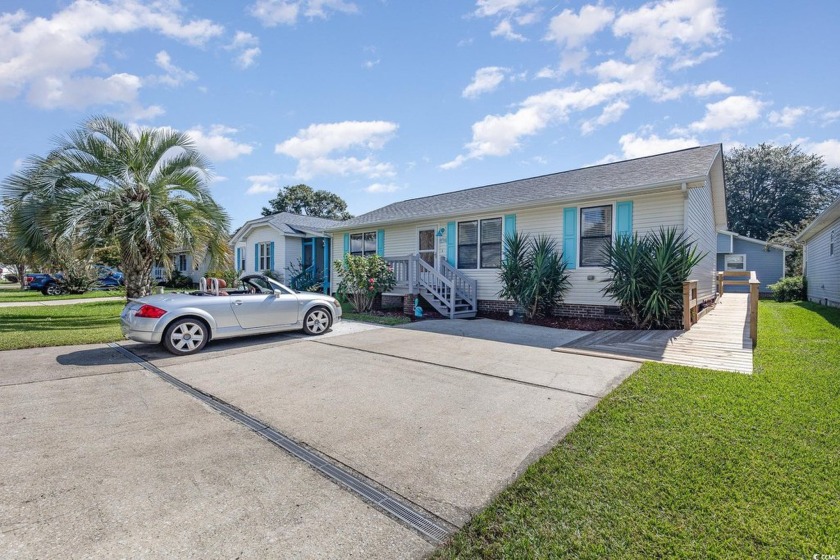 Welcome to your dream home in the picturesque seaside community - Beach Home for sale in Murrells Inlet, South Carolina on Beachhouse.com