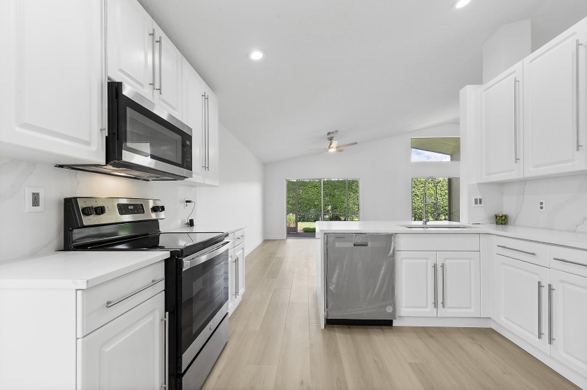 Beautifully renovated home with extensive upgrades! Enjoy a new - Beach Home for sale in Boynton Beach, Florida on Beachhouse.com
