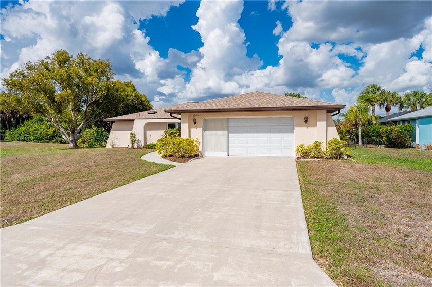 Three Bedroom, Two Bath, attached Two Car Garage Home located on - Beach Home for sale in Punta Gorda, Florida on Beachhouse.com