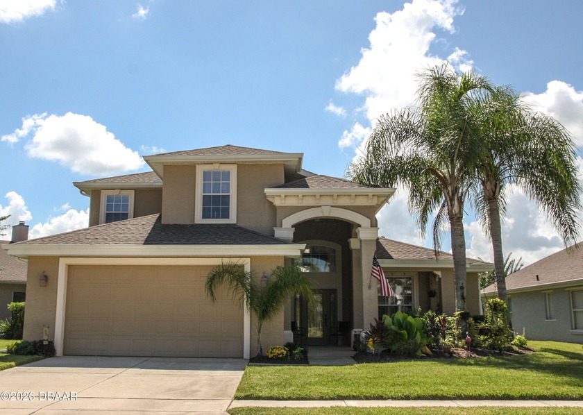 Beautiful 4 Bed 3 Bath + Den concrete block Lakefront home in - Beach Home for sale in Port Orange, Florida on Beachhouse.com