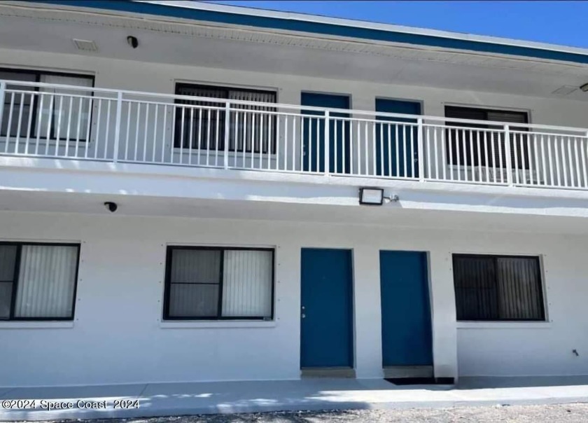 THIS BEAUTIFULLY REMODELED UNIT BOASTS AN UPDATED OPEN KITCHEN - Beach Condo for sale in Cocoa Beach, Florida on Beachhouse.com