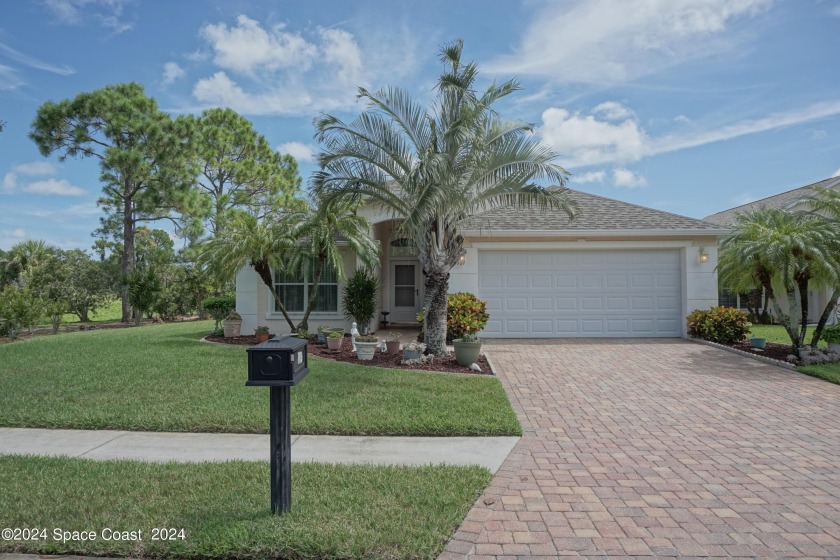 This home in the beautiful gated community of Fairway Isles has - Beach Home for sale in Palm Bay, Florida on Beachhouse.com