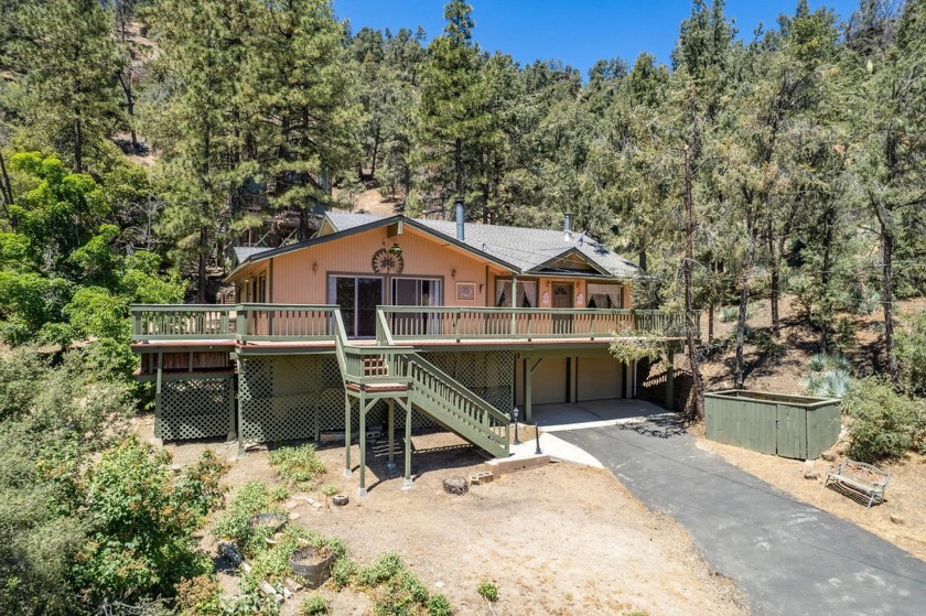 This two bedroom, two bath home has a two-car garage at ground - Beach Home for sale in Pine Mountain Club, California on Beachhouse.com