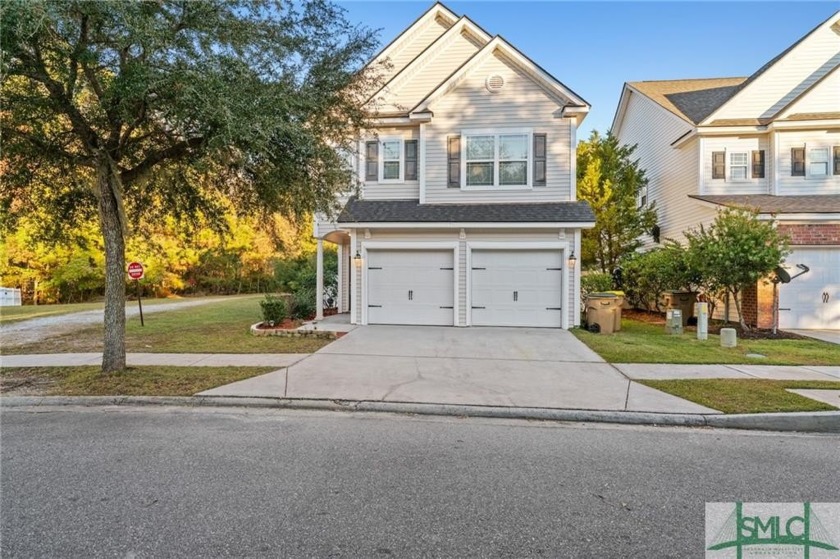 Discover this 3-bedroom, 2.5-bath home with a rare lagoon view - Beach Home for sale in Richmond Hill, Georgia on Beachhouse.com