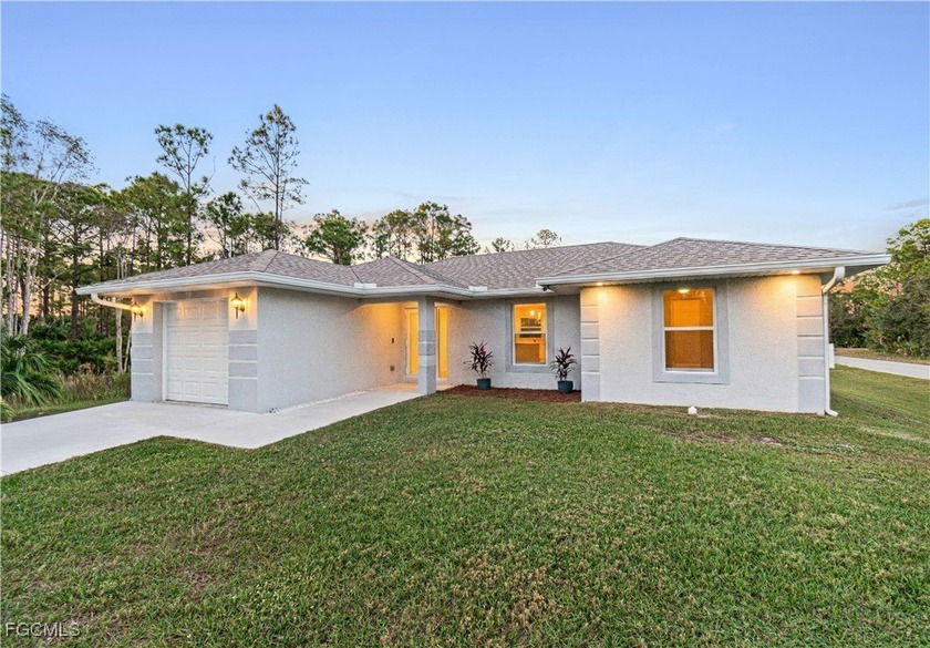 Welcome to this beautiful 3-bedroom, 2-bathroom home built in - Beach Home for sale in Lehigh Acres, Florida on Beachhouse.com