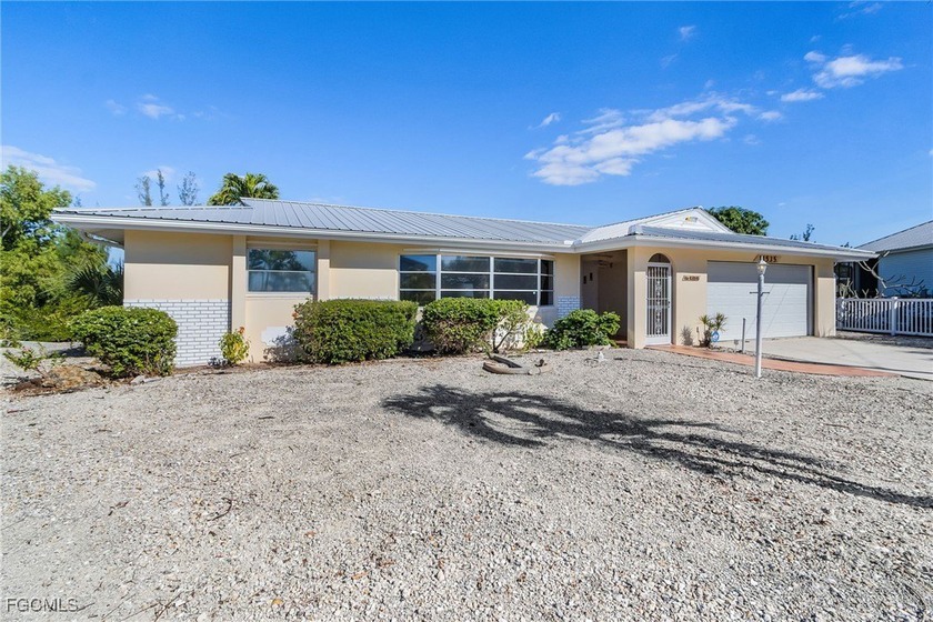 Nestled in the serene waterfront town of Bokeelia, this - Beach Home for sale in Bokeelia, Florida on Beachhouse.com