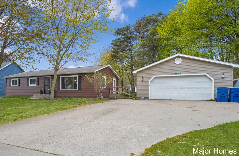 Experience the best of Ludington living in this beautifully - Beach Home for sale in Ludington, Michigan on Beachhouse.com