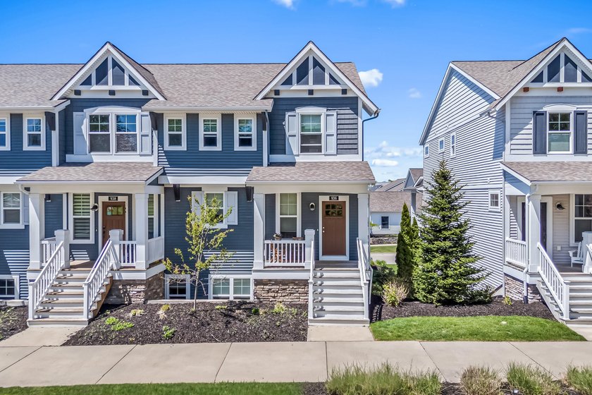 Discover elevated waterfront living at this beautifully - Beach Condo for sale in Whitehall, Michigan on Beachhouse.com