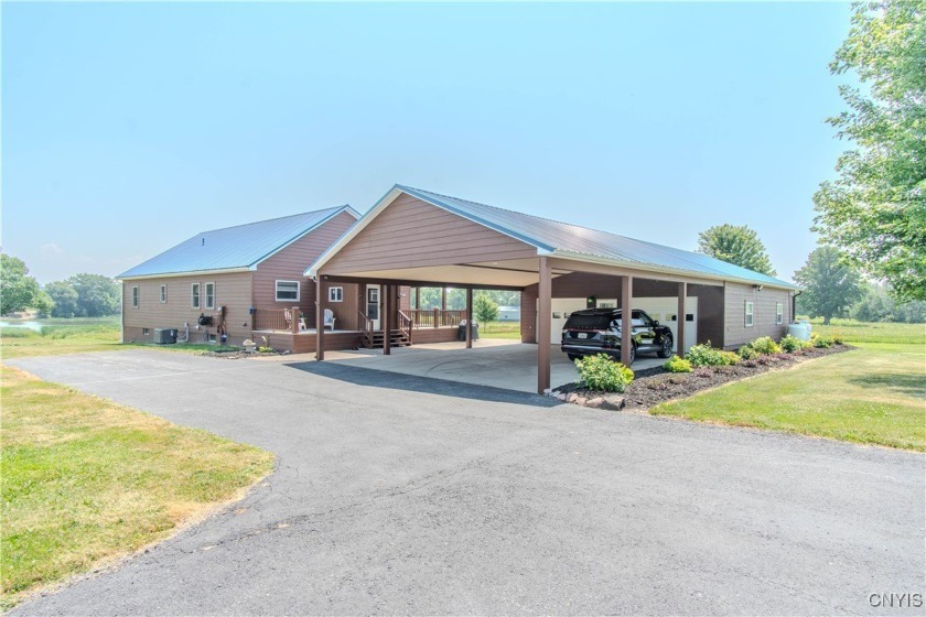 Discover this exceptional 3-bedroom, 1.5-bath ranch nestled on - Beach Home for sale in Chaumont, New York on Beachhouse.com