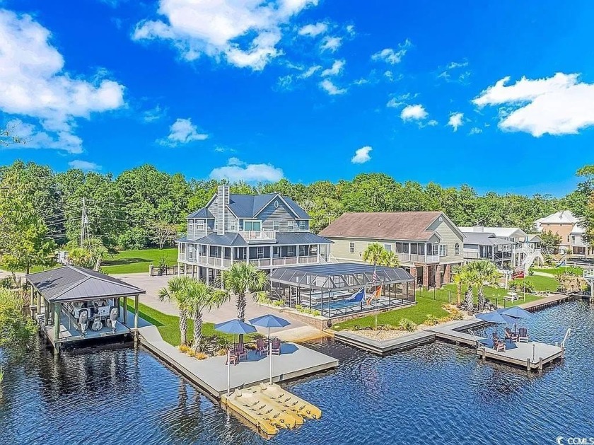 Prepare to be amazed by this one-of-a-kind 5-bedroom, 5-bathroom - Beach Home for sale in Myrtle Beach, South Carolina on Beachhouse.com