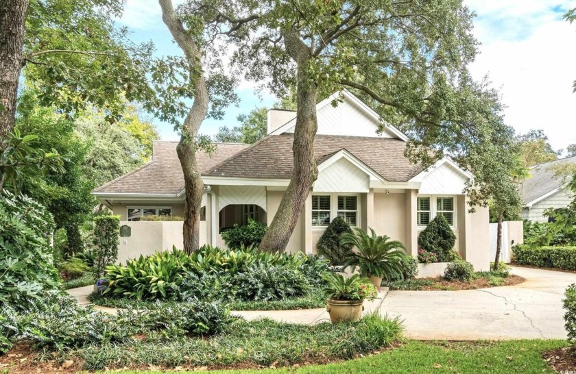 Chic beach retreat: modern style meets coastal charm! Located - Beach Home for sale in Myrtle Beach, South Carolina on Beachhouse.com