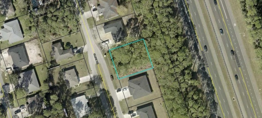Build a single family home or Duplex on this lot located close - Beach Lot for sale in Palm Coast, Florida on Beachhouse.com