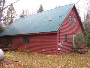 This three bedroom home nestled within 5 acres offers something - Beach Home for sale in Grand Marais, Michigan on Beachhouse.com