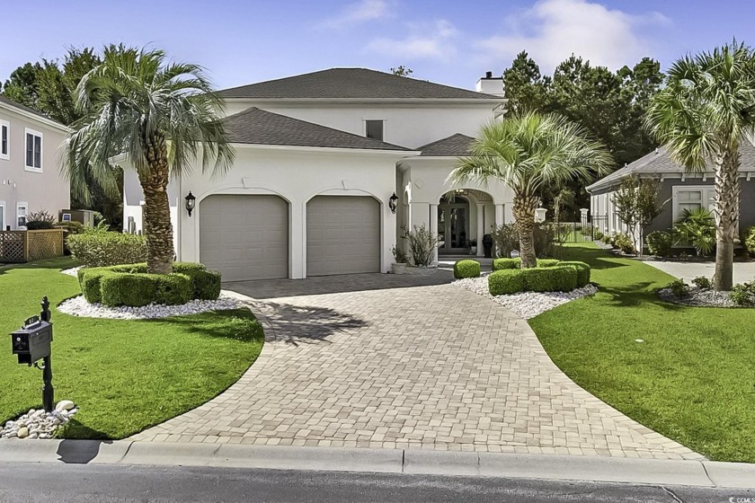 This stunning Mediterranean-style home, nestled in the - Beach Home for sale in Myrtle Beach, South Carolina on Beachhouse.com