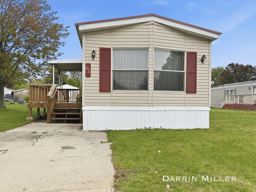 Welcome to this charming 2 bedroom, 2 bath mobile home located - Beach Home for sale in Muskegon, Michigan on Beachhouse.com