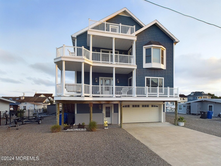 Experience waterfront living at 1833 Cable Drive in Snug Harbor - Beach Home for sale in Toms River, New Jersey on Beachhouse.com