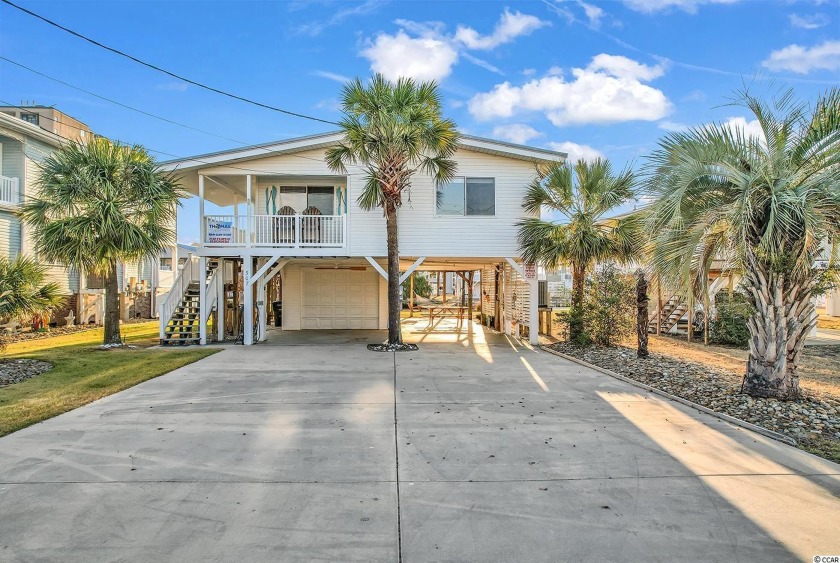 Beautiful channel home with boat dock! Only 2 blocks from the - Beach Home for sale in North Myrtle Beach, South Carolina on Beachhouse.com