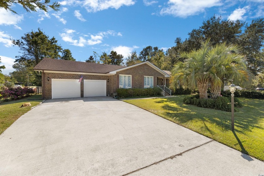 This SPACIOUS BRICK RANCH Is MOVE IN READY, and Has All The - Beach Home for sale in Surfside Beach, South Carolina on Beachhouse.com