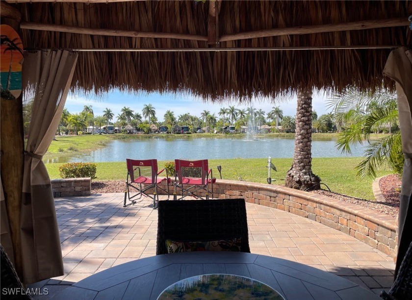 This beautiful Sunset Lake fully paved site, facing West, is - Beach Lot for sale in Fort Myers, Florida on Beachhouse.com