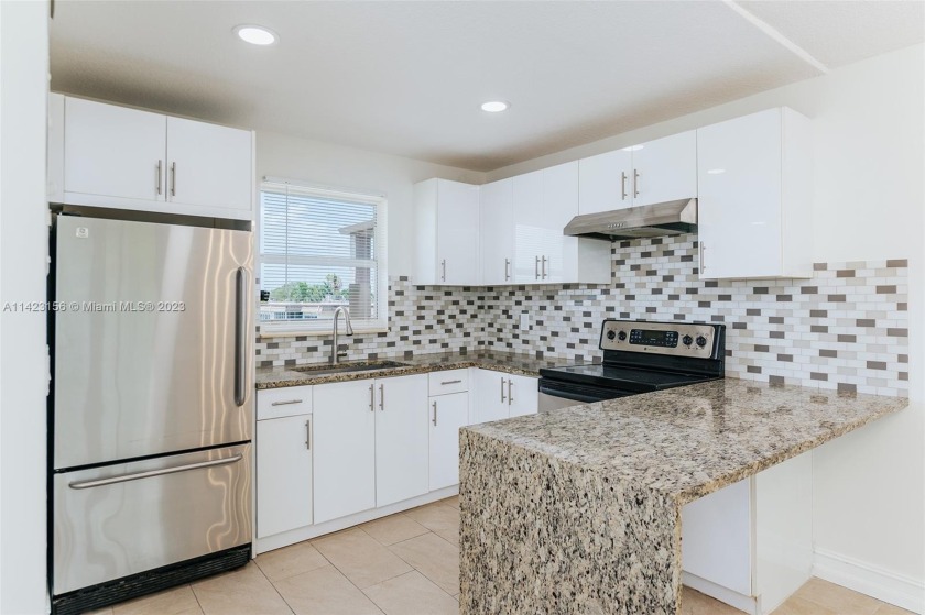 This completely renovated, corner unit condo is ready to move - Beach Condo for sale in Palm Springs, Florida on Beachhouse.com