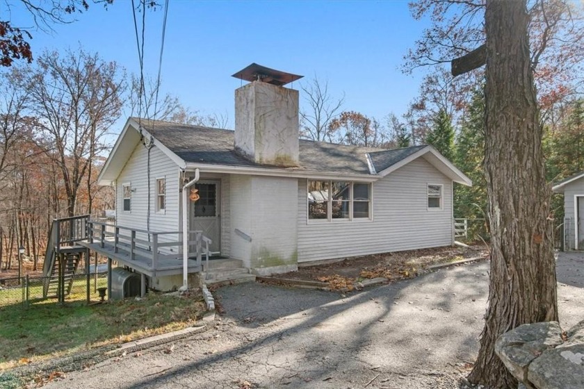 This charming ranch-style home, nestled on just shy of an acre - Beach Home for sale in Kent, New York on Beachhouse.com