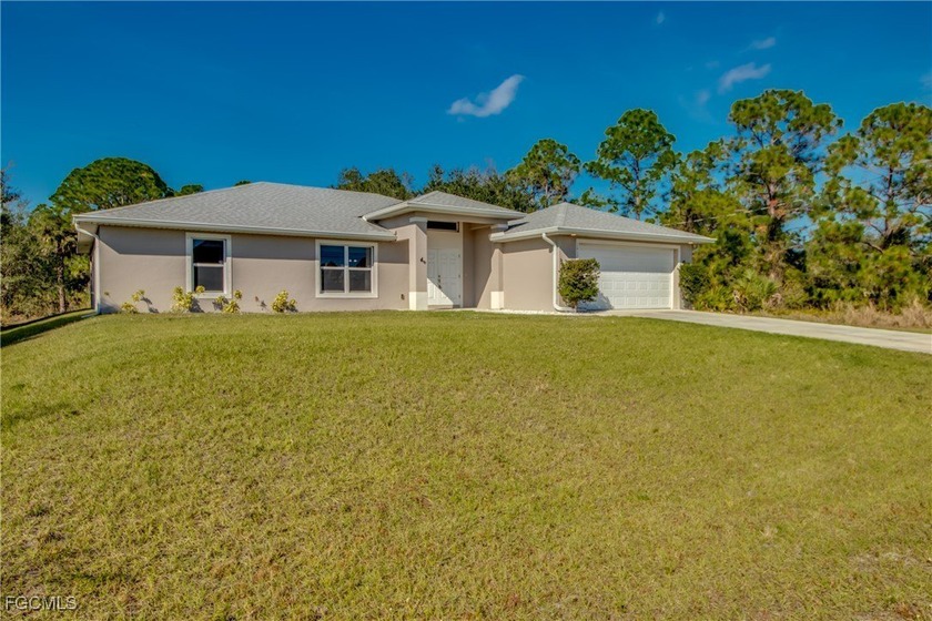 This beautifully maintained 3-bedroom, 2-bath home with 1,527 sq - Beach Home for sale in Lehigh Acres, Florida on Beachhouse.com