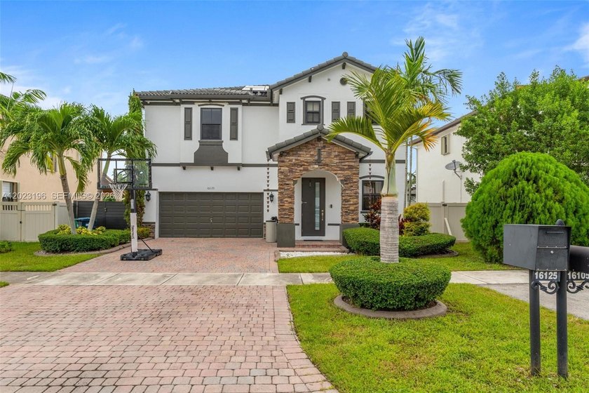 Welcome to this stunning 5 bedroom, 3 bathroom residence tucked - Beach Home for sale in Miami, Florida on Beachhouse.com