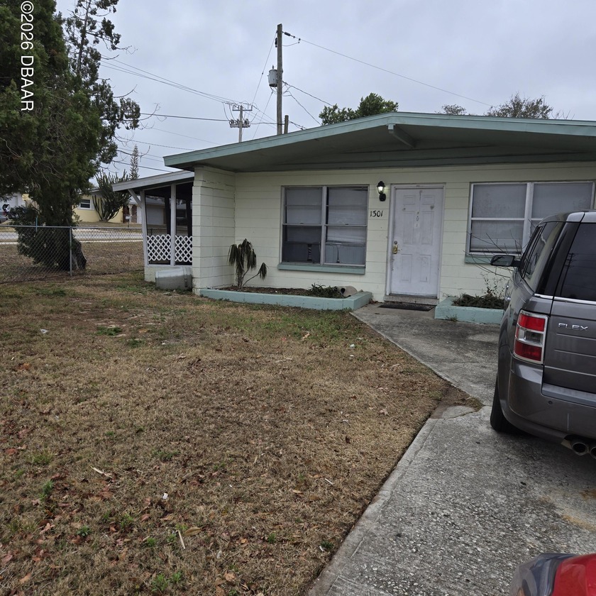 INVESTOR ALERT!!!!! Well-maintained two-family duplex situated - Beach Home for sale in Daytona Beach, Florida on Beachhouse.com