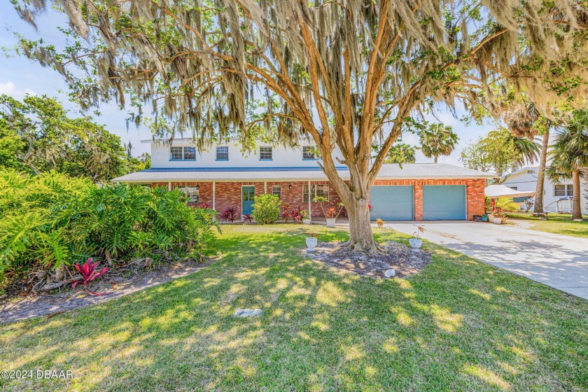 Welcome to the heart of South Daytona's Palm Grove, where this - Beach Home for sale in South Daytona, Florida on Beachhouse.com