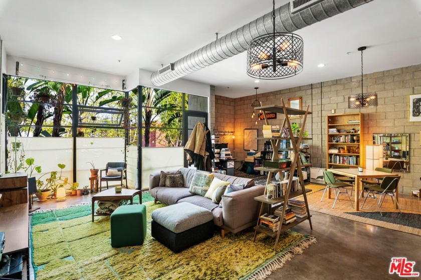Designed by acclaimed architects Pugh + Scarpa, this Santa - Beach Condo for sale in Santa Monica, California on Beachhouse.com