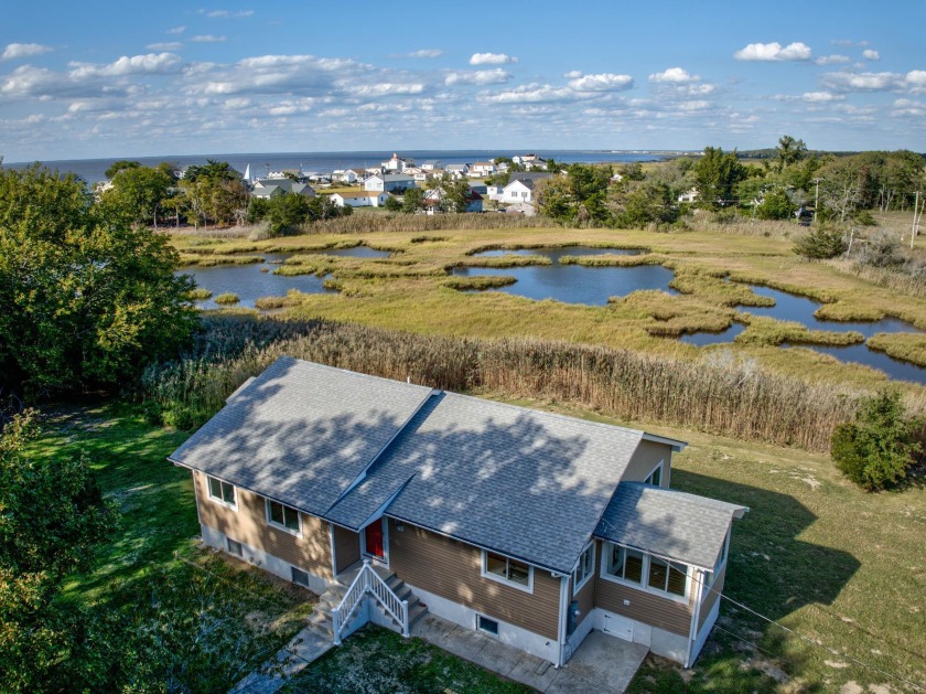 This beautifully remodeled home sits on approximately over an - Beach Home for sale in Cape May Court House, New Jersey on Beachhouse.com