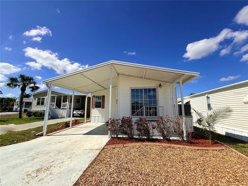 Located in the desirable Pelican Harbor 55+ community, this - Beach Home for sale in Punta Gorda, Florida on Beachhouse.com