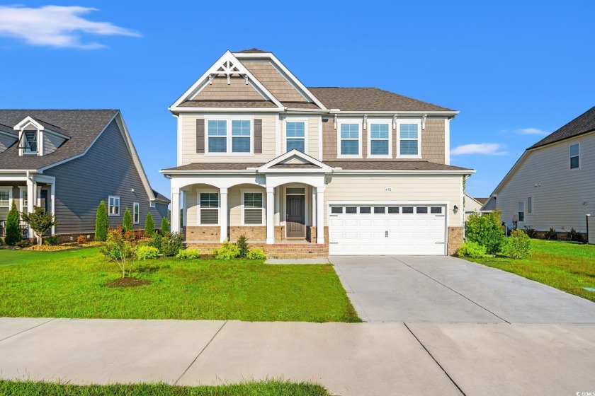 Welcome to this lake front 4 bedroom 2.5 bath home with a large - Beach Home for sale in Myrtle Beach, South Carolina on Beachhouse.com