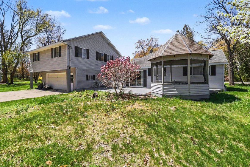 Discover endless opportunity with this expansive 7-bedroom - Beach Home for sale in Manistee, Michigan on Beachhouse.com