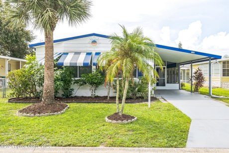 Beautiful, remodeled 2 bedroom/ 2 bathroom home with a carport - Beach Home for sale in Barefoot Bay, Florida on Beachhouse.com