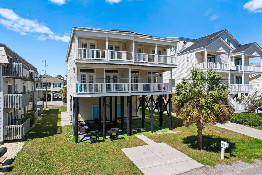 Outstanding income opportunity in North Myrtle Beach! This 8 - Beach Townhome/Townhouse for sale in North Myrtle Beach, South Carolina on Beachhouse.com