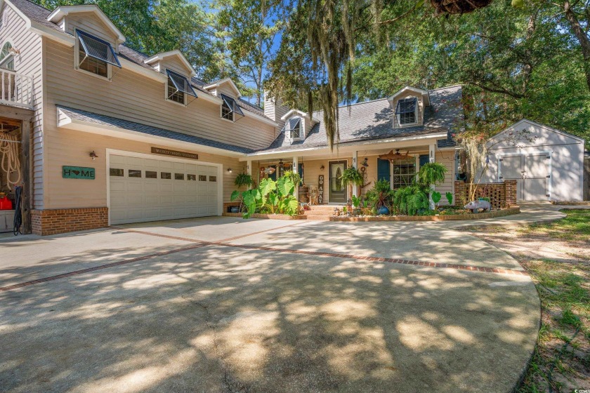 Welcome to coastal living on Pawleys Island. This two-story home - Beach Home for sale in Pawleys Island, South Carolina on Beachhouse.com