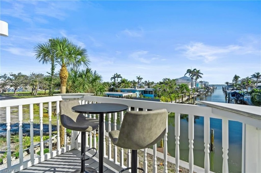 LUXURIOUS Corner WATERFRONT Condo with BAY VIEWS  BOAT SLIP in - Beach Home for sale in Fort Myers Beach, Florida on Beachhouse.com