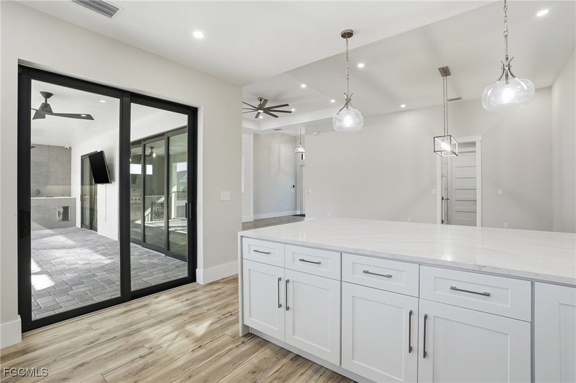 Stunning New Construction home featuring 3 spacious bedrooms + a - Beach Home for sale in Cape Coral, Florida on Beachhouse.com