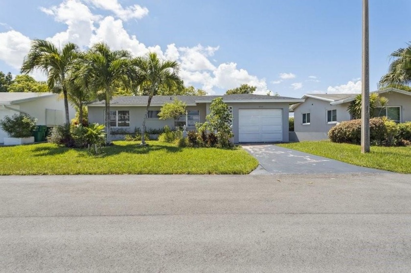 Nestled in the heart of Tamarac, this delightful property - Beach Home for sale in Tamarac, Florida on Beachhouse.com