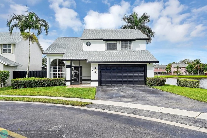 Step into the epitome of suburban living, situated in the heart - Beach Home for sale in Sunrise, Florida on Beachhouse.com