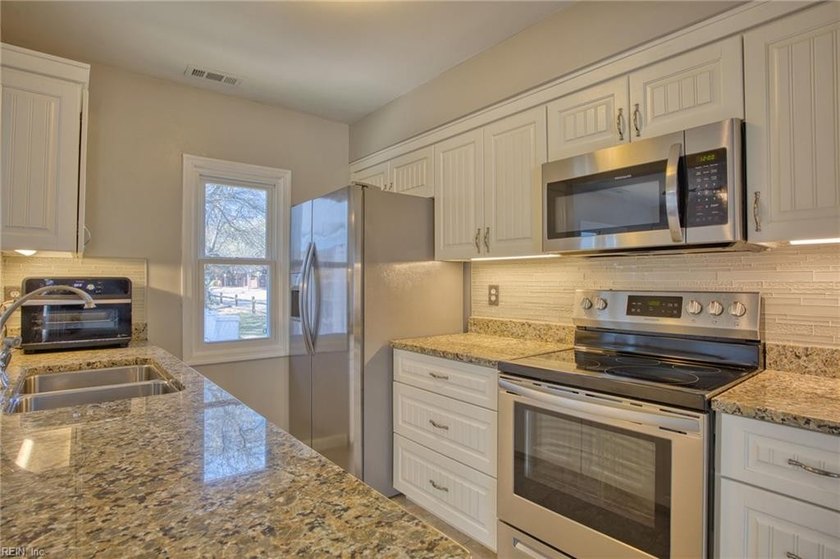 Experience elevated coastal living in this newly renovated - Beach Condo for sale in Virginia Beach, Virginia on Beachhouse.com