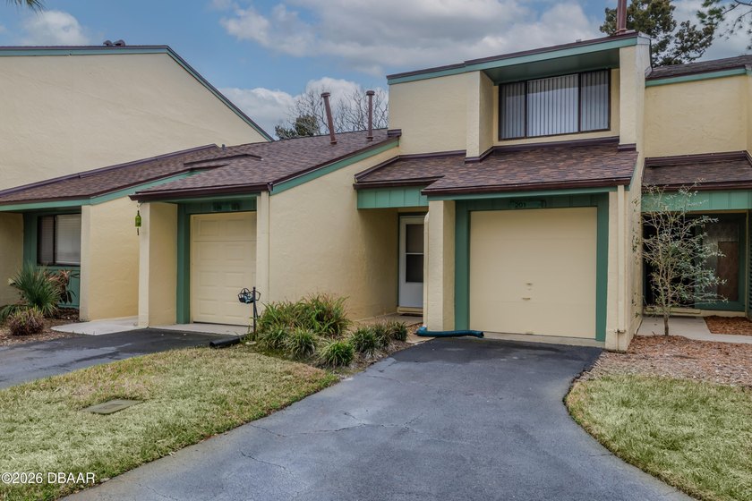 Tucked inside one of the area's most sought-after golf - Beach Condo for sale in New Smyrna Beach, Florida on Beachhouse.com
