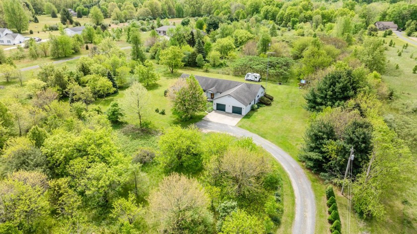 Welcome to this spacious 5-bedroom, 3-bath ranch in Coloma, set - Beach Home for sale in Coloma, Michigan on Beachhouse.com