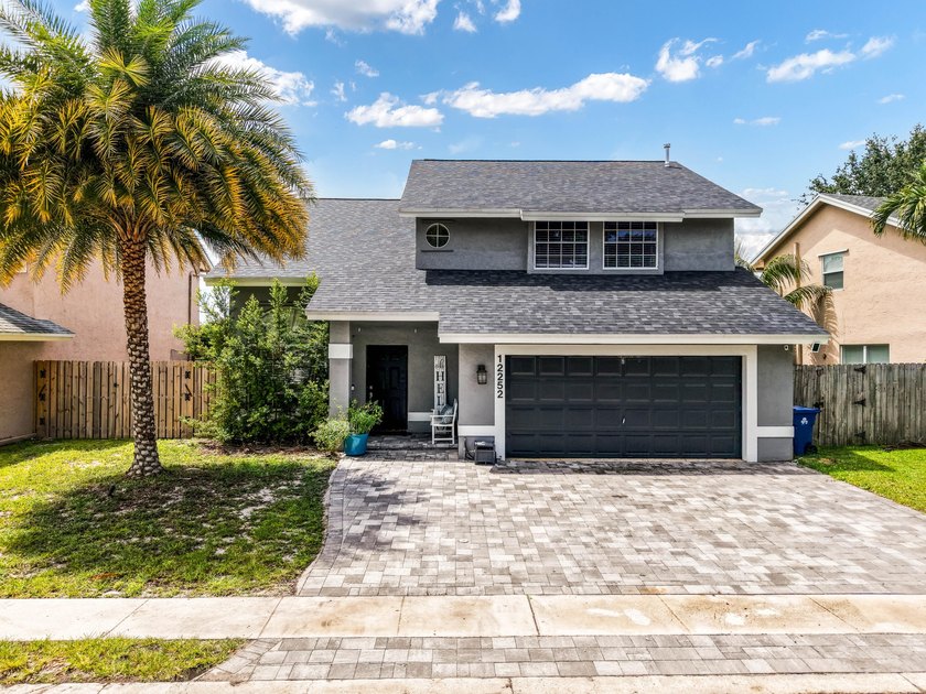 Beautiful 4Brt/2.5Ba, Lakefront, pool home. New roof, New A/C - Beach Home for sale in Sunrise, Florida on Beachhouse.com