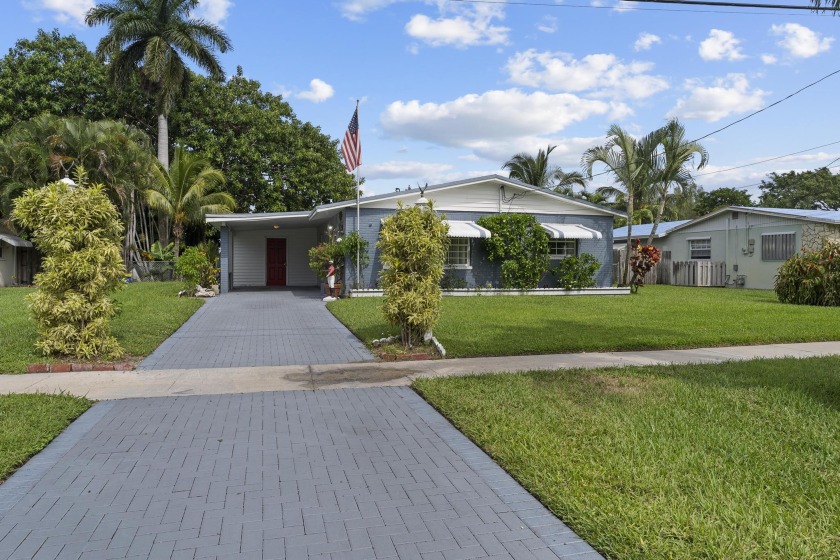 Welcome to comfort in this expansive 2-bed, 1-bath home nestled - Beach Home for sale in Palm Springs, Florida on Beachhouse.com